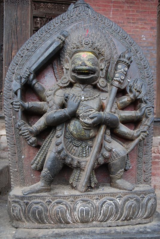 Kathmandu Bhaktapur 06-6 Nyatapola Temple Stairway Singhini Lion Goddess Here is a close up of Singhini, the lion goddess, on the top of the stairway to the Nyatapola Temple in Bhaktapur.